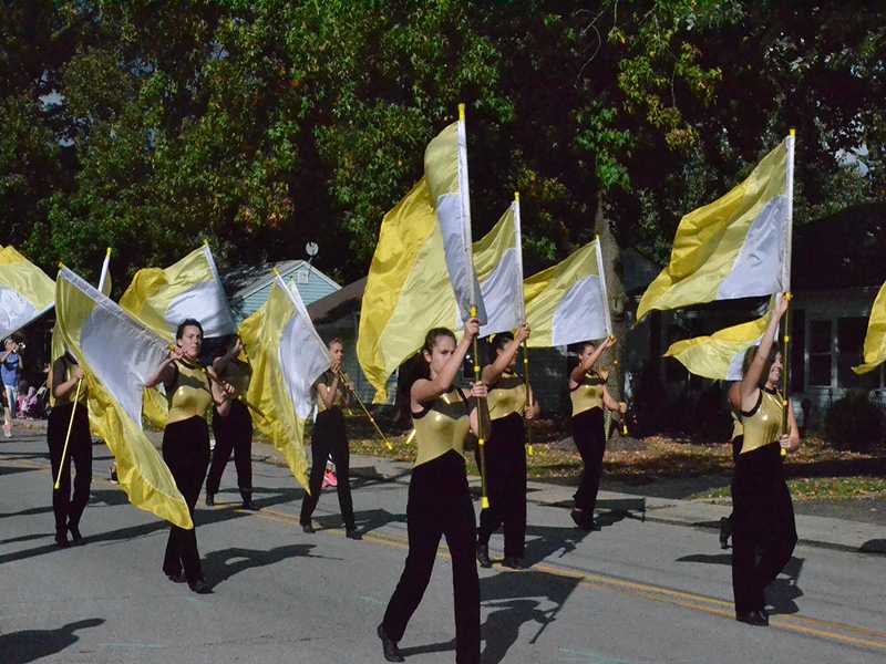 The guard begins the parade by marching down Monument Street.

[Guard] gave me a life and a purpose in High School. -Tori Herd
