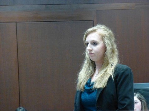 Junior Alyse Millikan questions a witness. This year is Millikan's first year on the team and as a lawyer.
