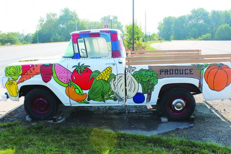 National Art Honor Society’s first project of the year was painting the produce truck for the farmers market. Sophomore Katie Flor, junior Kenzie Day and seniors Paul Williams and Nick Green all put in a mutual effort to create the artwork.