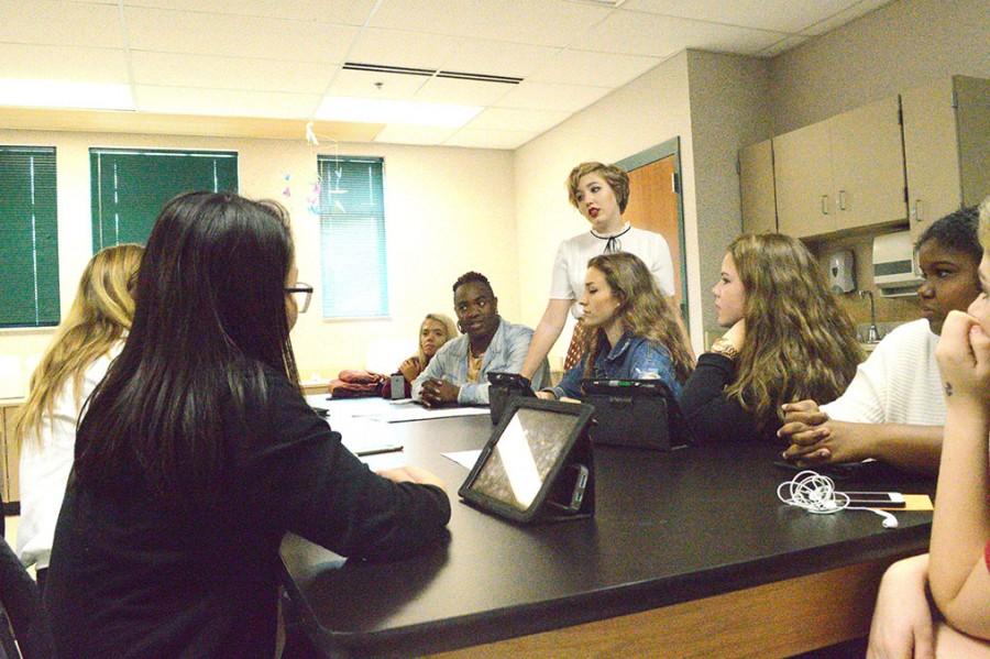 Fashion Club president Emma Paris meets with each group during a Fashion Club meeting. Students focus on getting ready for their first fashion show of the year.