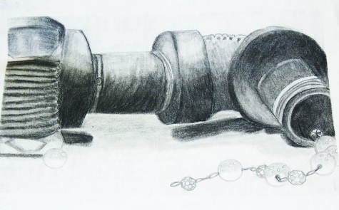 Junior Olivia Doherty showed her drawing of an industrial pipe. This drawing was done for a project over value and shading. 