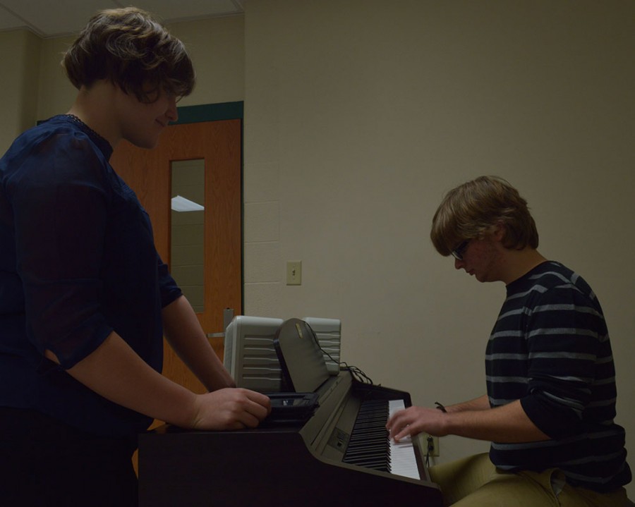 Seniors Kelsey Bowyer and Jonathan Petro meet after school, in their free time, to produce each episode of Fine Arts Friday, starting with the iconic theme song. Though Bowyer wrote the chords for the theme, Petro plays it for every episode.