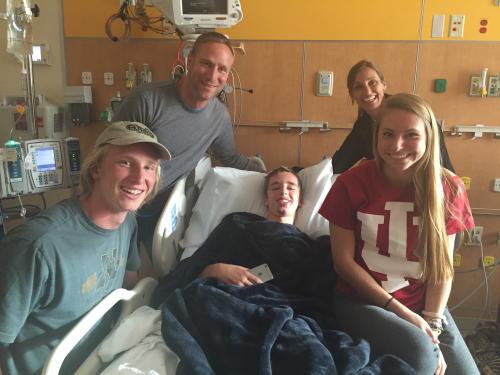 Sophomore Seth Knoll visits with his family members Fred, Alisa, Conner and Lydia at Riley Hospital 