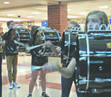 Cami Smith and the drumline play in the commons. The drumline plays on Friday mornings in the fall football season to encourage school spirit.