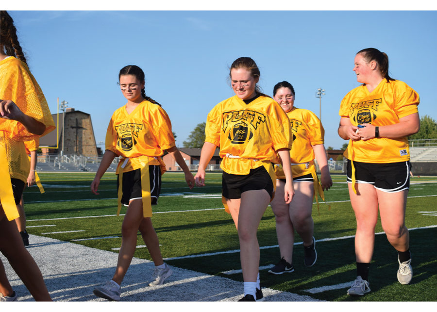 The sophomore Powderpuff team walks off Beaver Materials field in disappointment. They lost to the freshmen powderpuff team.