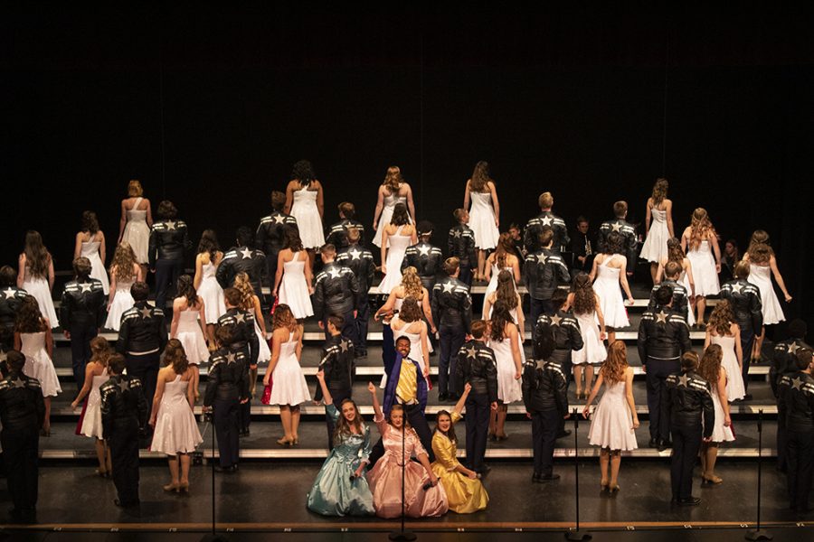 Dancing into the winning circle: NHS varsity show choirs are grand champs after their first competition