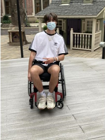 Shortly after being released from the hospital, Griffin Smith poses in his backyard. Smiths doctors are amazed at his progress.