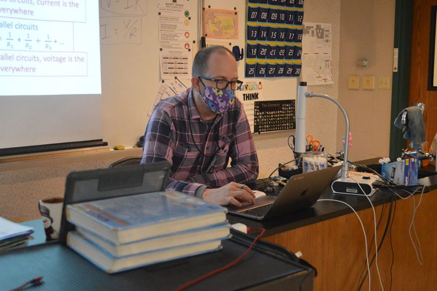 Snyder teaches students over zoom from his classroom