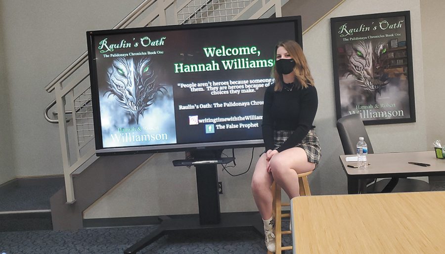 NHS junior Hannah Williamson holds an Author Day at Noblesville East Middle School. She discussed what it was like publishing a book at such a young age.