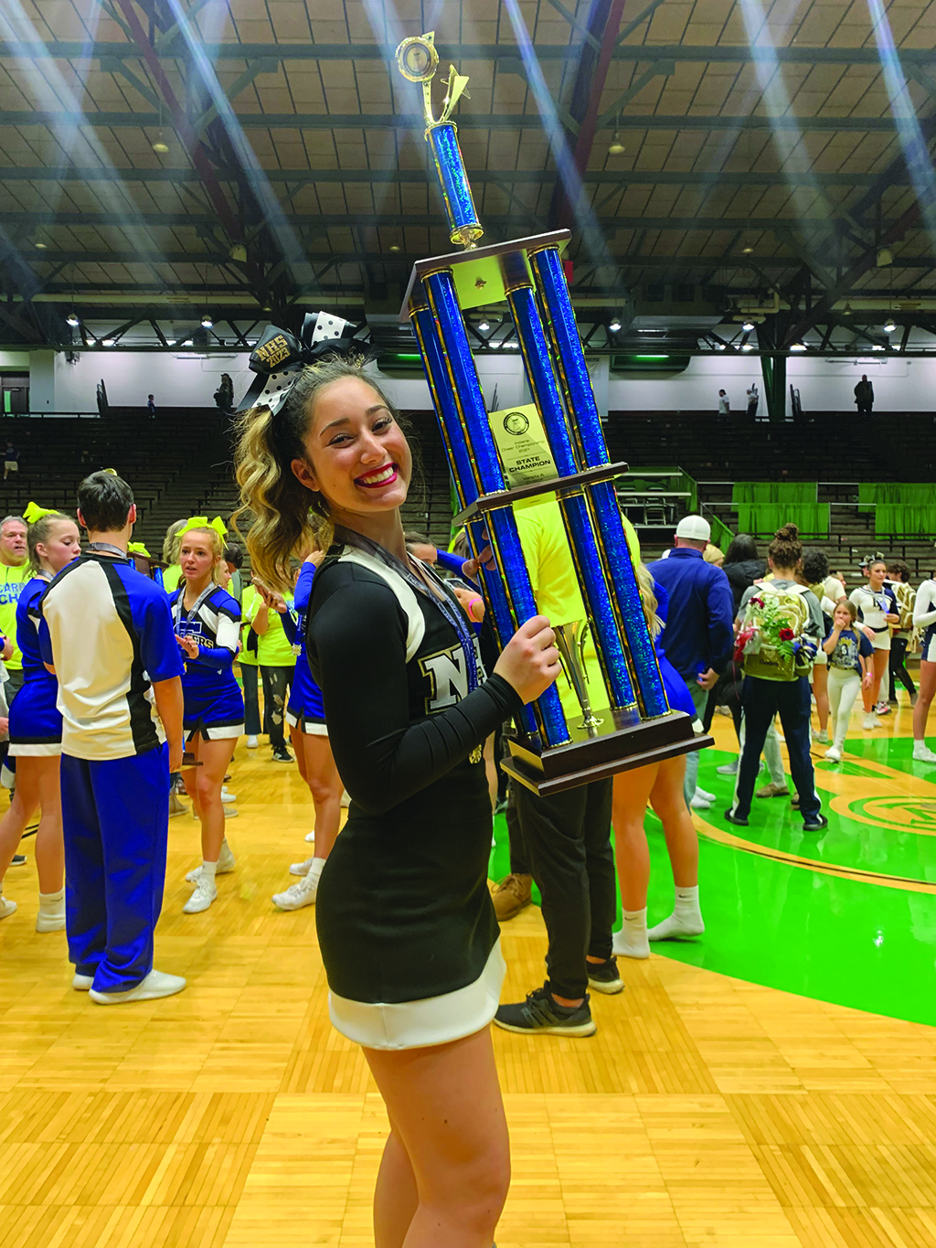 Bring it on: NHS cheerleader Lyza Saunders shares her motivations behind the teams’ state win