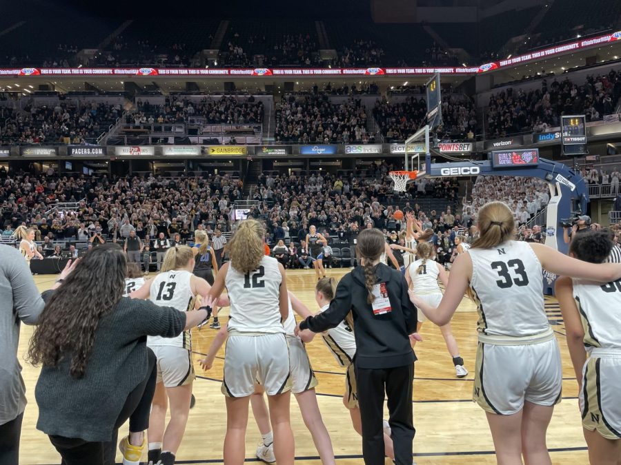 Ava Shoemaker (left), Ashlynn Shade (middle), Brooklyn Smitherman (Right) Dani Mendez (Far Right) prepare to celebrate as the clock ticks down during the State Championship Game. The Millers defeated Franklin Community 76-52. 