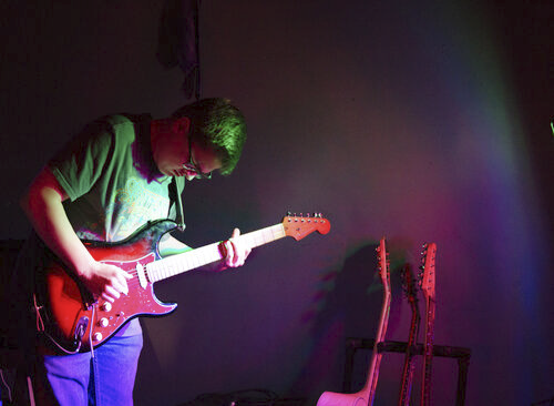 Matthews jams out on his guitar at an Indy Gorgeous club concert. He has played with IGC since freshman year. 