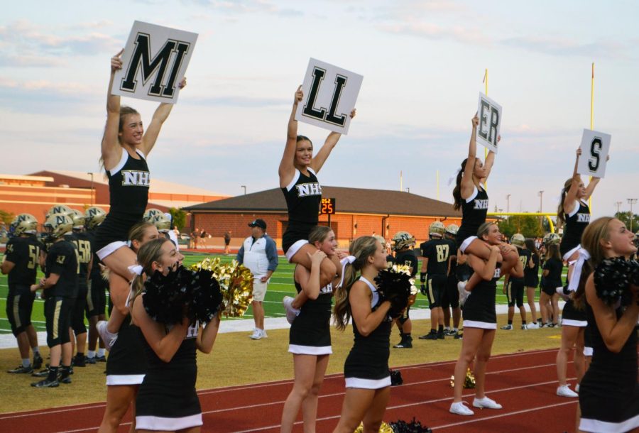 The cheerleaders spell out Millers in front of the crowd. The audience is electrified. 