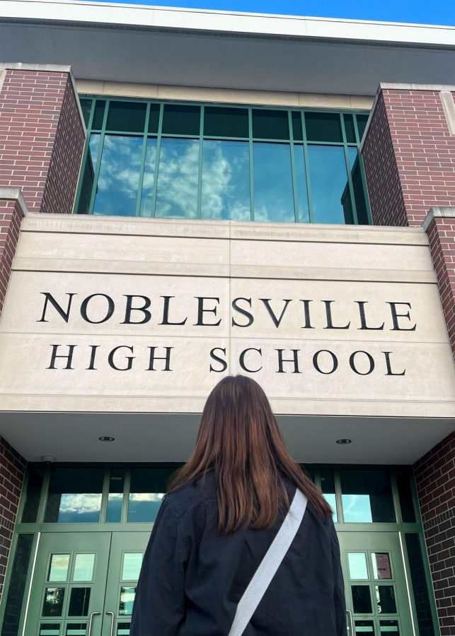 A+student+looks+up+at+Noblesville+High+School.+This+is+their+first+year+at+NHS.