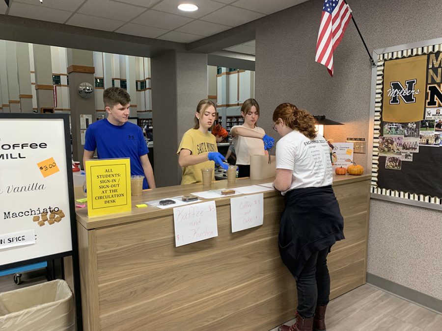 The German club sells coffee and baked goods in the library. Students can raise money for their clubs by signing up to work at the Coffee Mill. 
