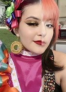 Kaylee Reyes poses in both her folkloric dance look and her every day makeup look. She says both styles are integral to her identity.