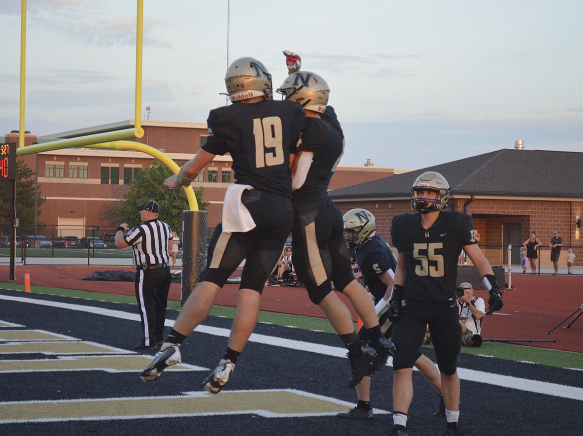 Seniors+Jacob+Baker+and+Logan+Shoffner%2C+quarterback+and+running+back%2C+respectively%2C+celebrate+a+touchdown.