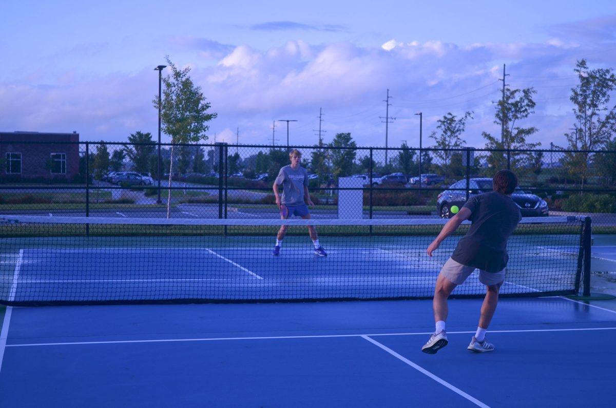 Two+Fishers+students+playing+pickleball+at+Finch+Creek+park.+They+regularly+play+for+fun.