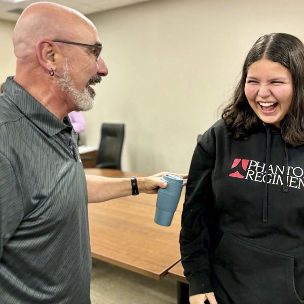 After finding out about the Lilly Scholarship, Megan Broviak shares the news with Eric Thornbury. This is the second year in a row that an NHS student has won the Lilly Scholarship.