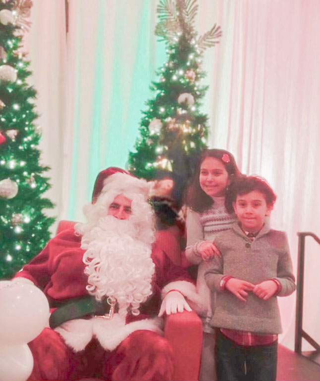 Lewis' father dresses as Santa each year for Christmas. This tradition brings the family closer together during the holidays.