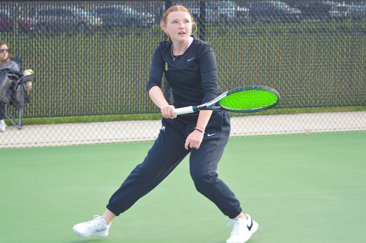 Last year Emma Bogan played as an alternate between junior varsity and the varsity tennis teams. Now as a junior, Bogan has earned a permanent spot on the varsity team.