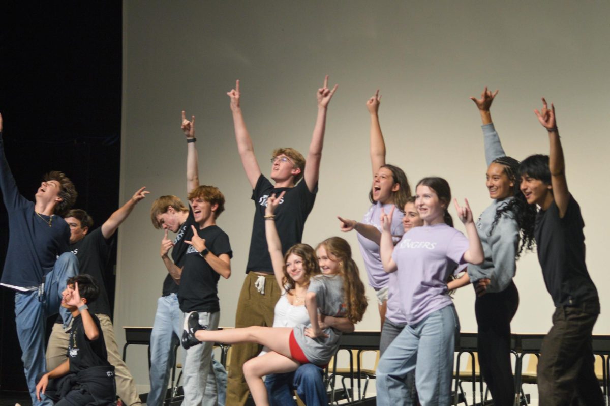 Entire cast of "School of Rock" preforming a group song during a night of rehersals.